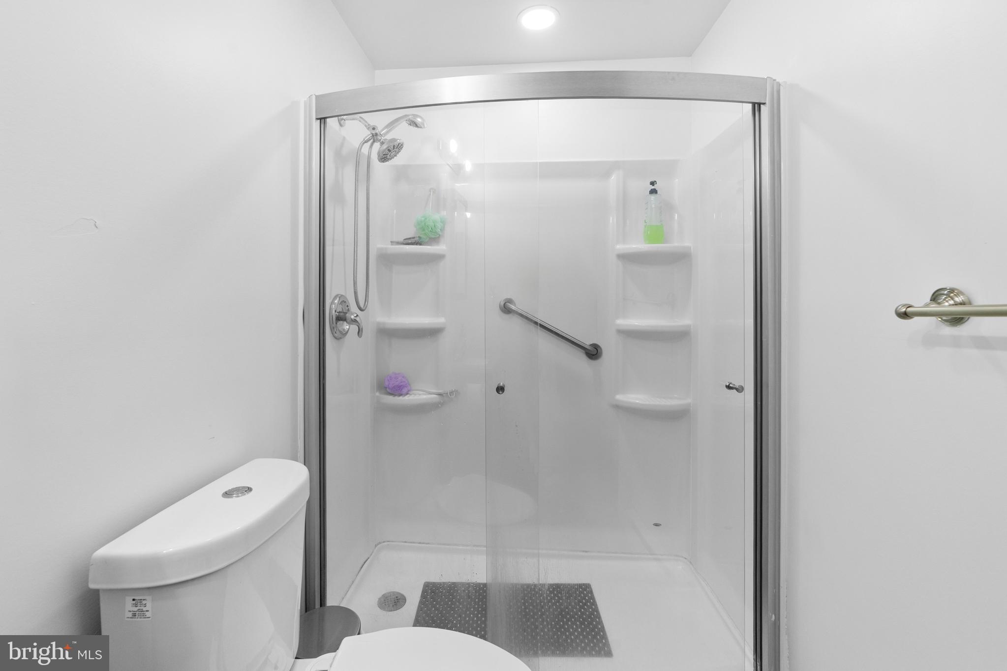 25C Pitman Road, Unit B Monroe Township, NJ 08831 - Photo 23 of 29 a bathroom with a shower and toilet