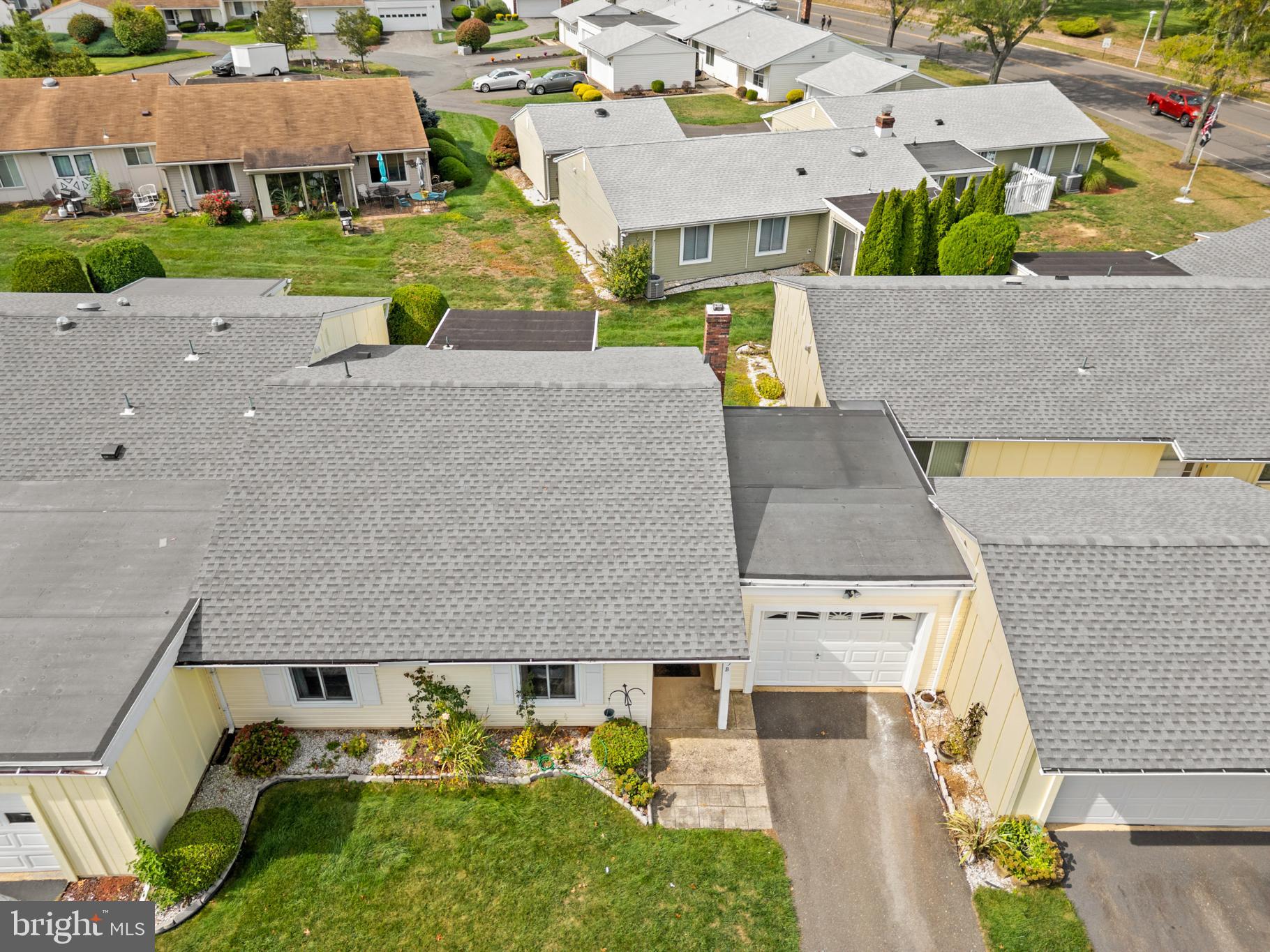25C Pitman Road, Unit B Monroe Township, NJ 08831 - Photo 4 of 29 an aerial view of a house with a yard