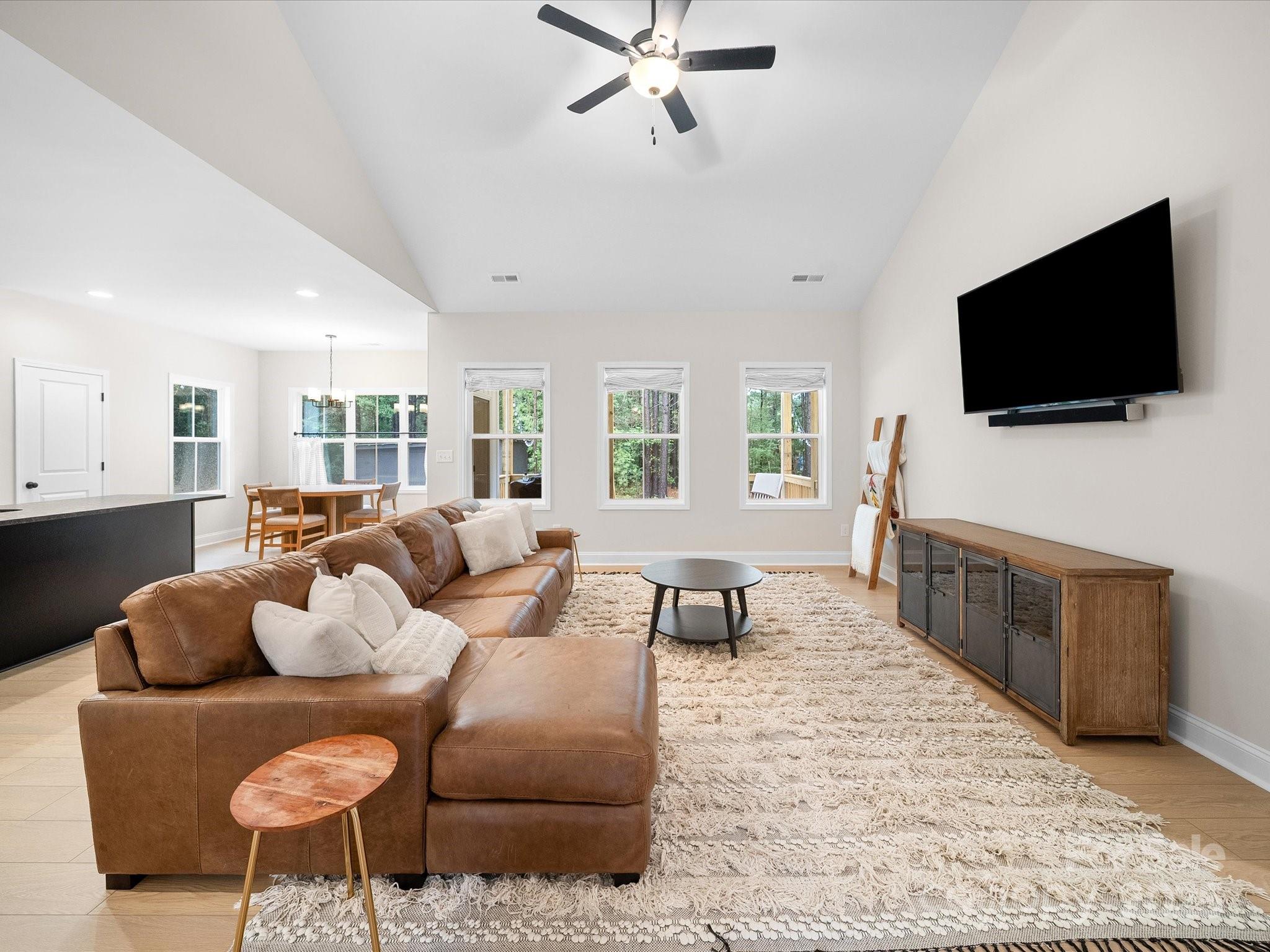 5408 Unionville Road Monroe, NC 28110 - Photo 13 of 31 a living room with furniture and a flat screen tv
