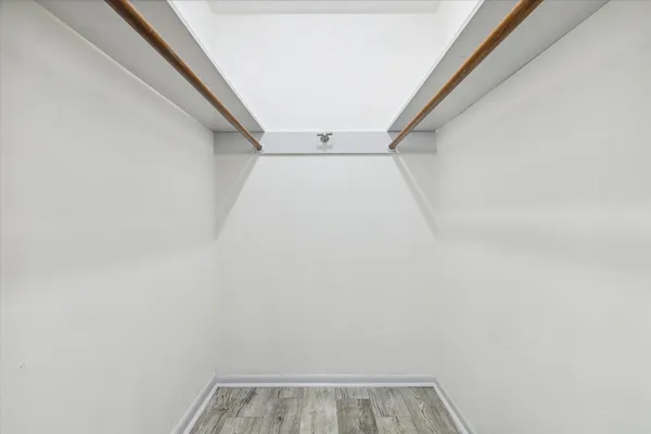 a view of wooden floor in hallway