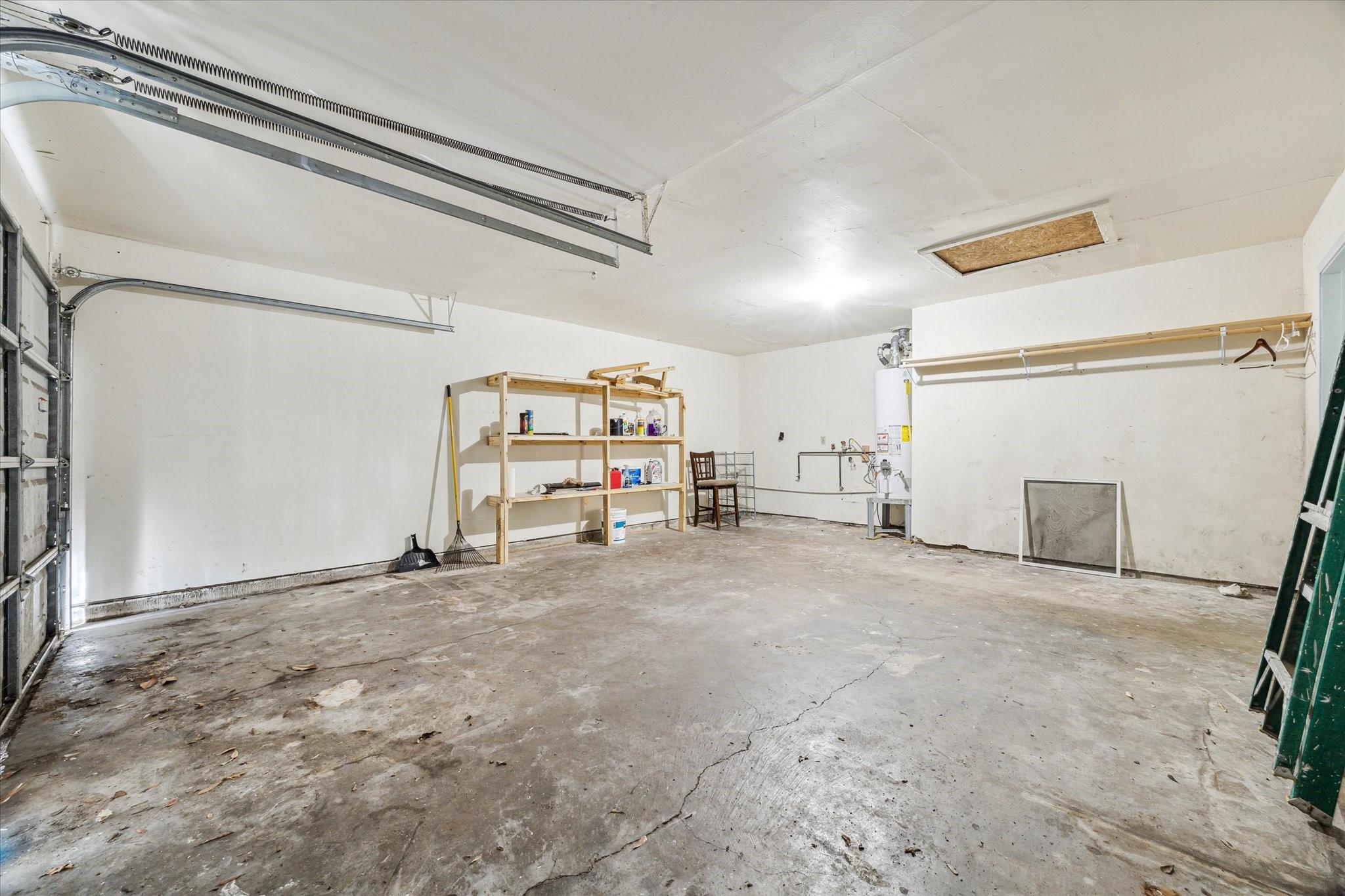 8814 Jason Street Houston, TX 77074 - Photo 12 of 14 a view of a livingroom with racks on the wall