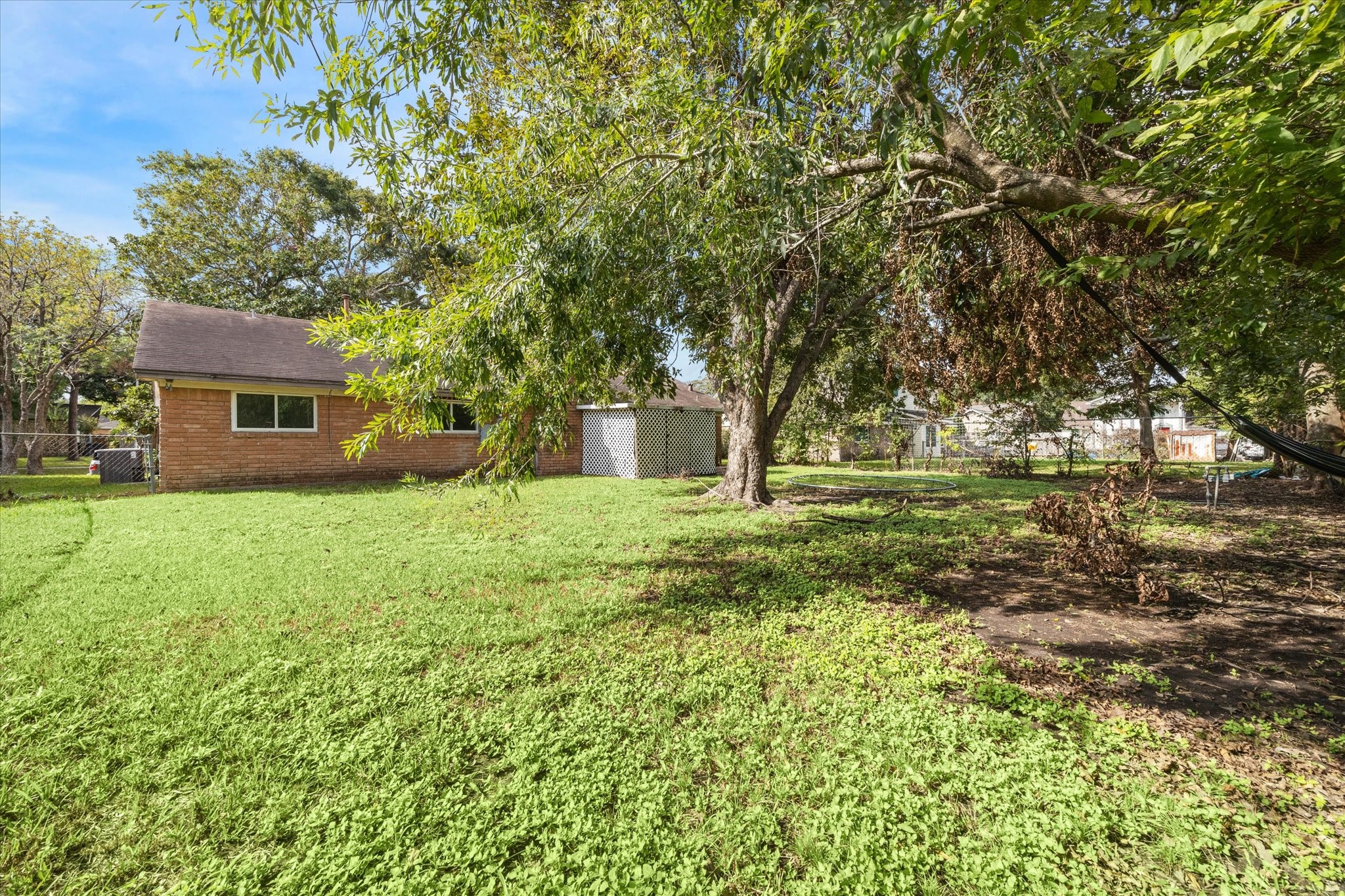 8814 Jason Street Houston, TX 77074 - Photo 14 of 14 a front view of a house with a yard