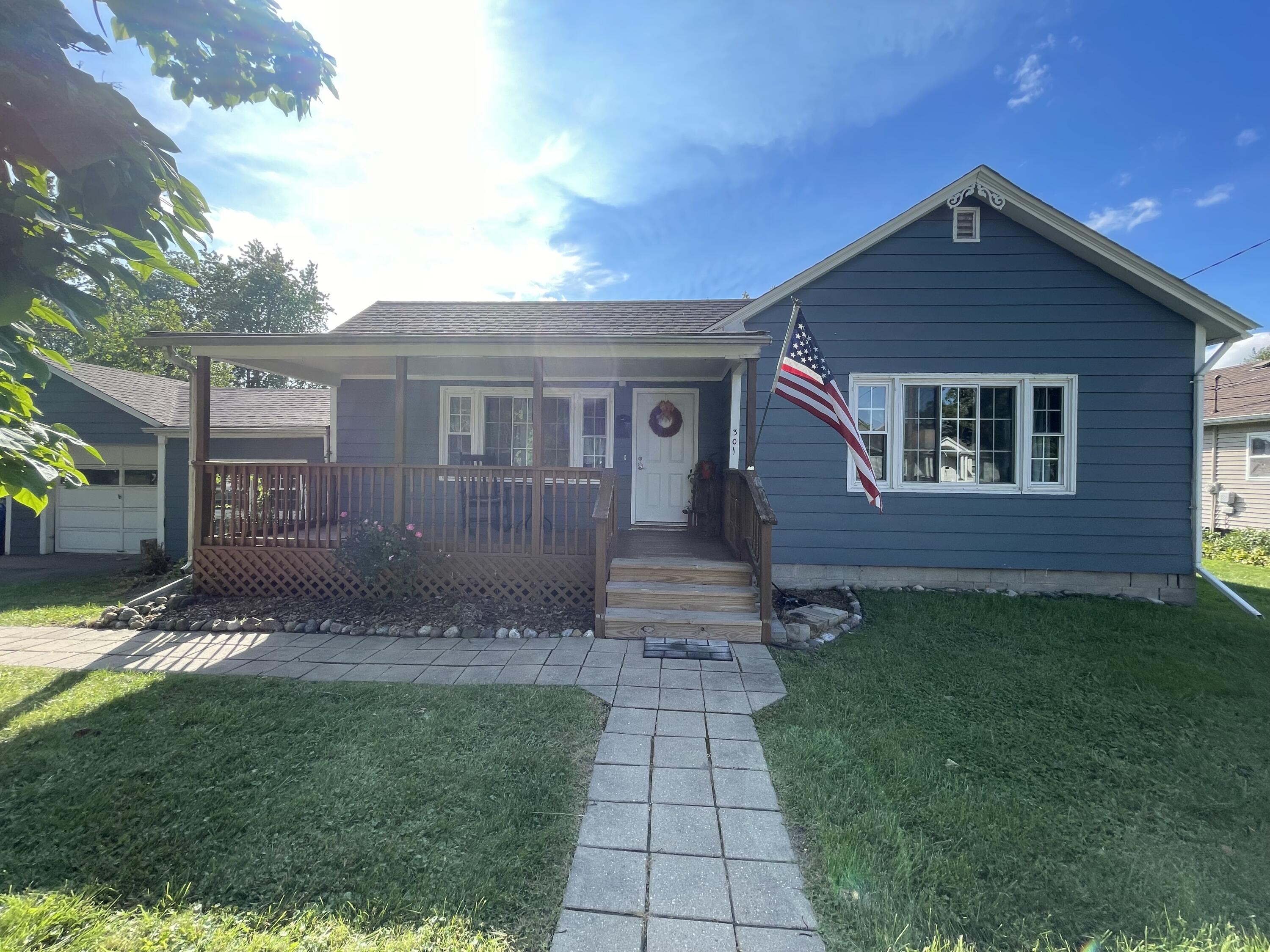 301 Hoffman Street Crown Point, IN 46307 - Photo 1 of 15 a front view of a house with a yard