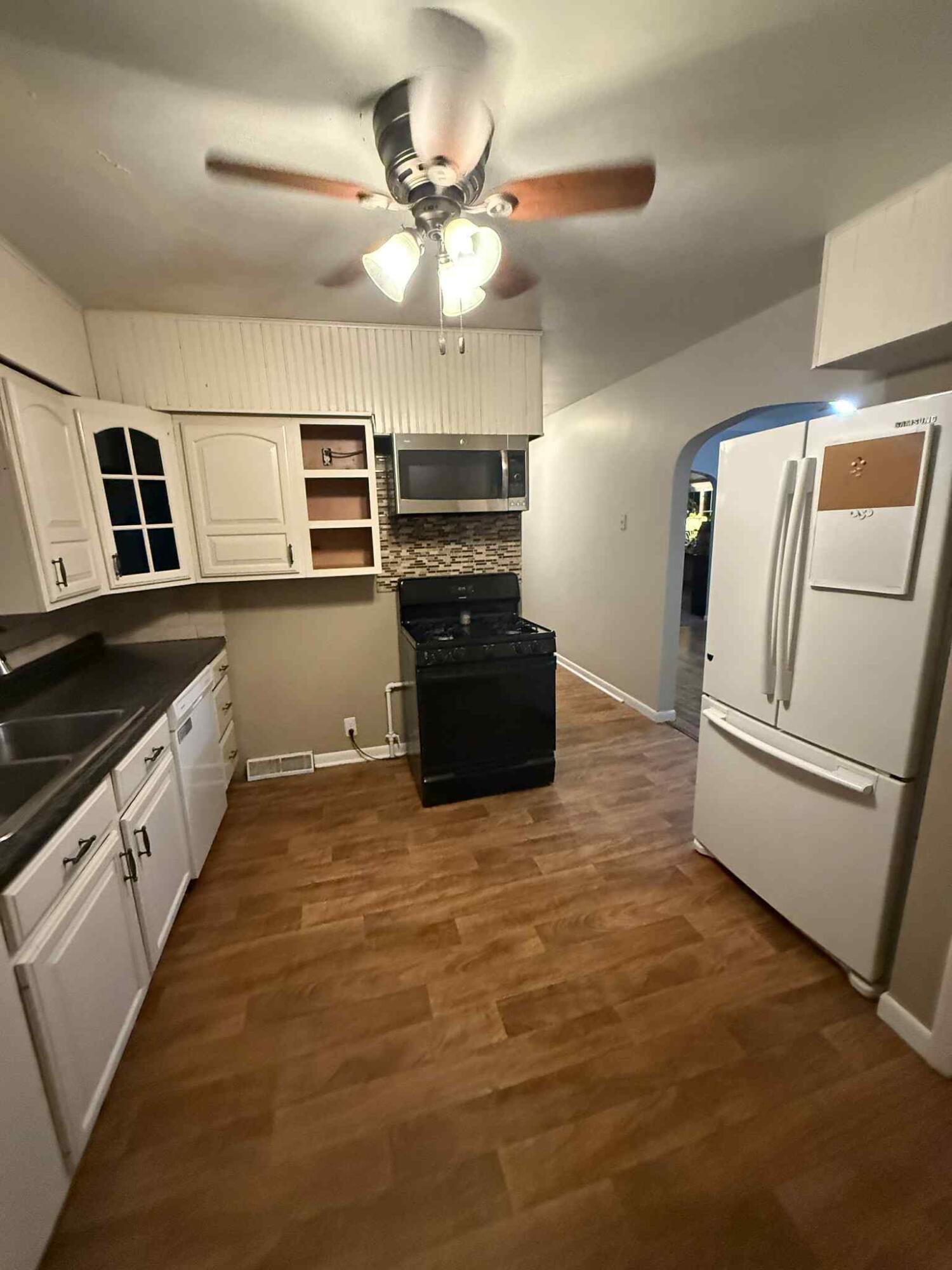 301 Hoffman Street Crown Point, IN 46307 - Photo 10 of 15 a kitchen with kitchen island a counter top space appliances and cabinets