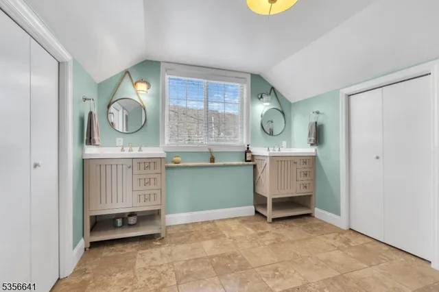 a room with cabinets and window