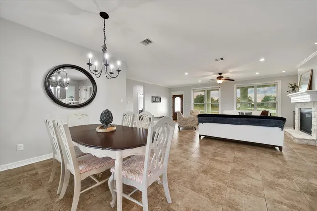a bedroom with a bed couch and window