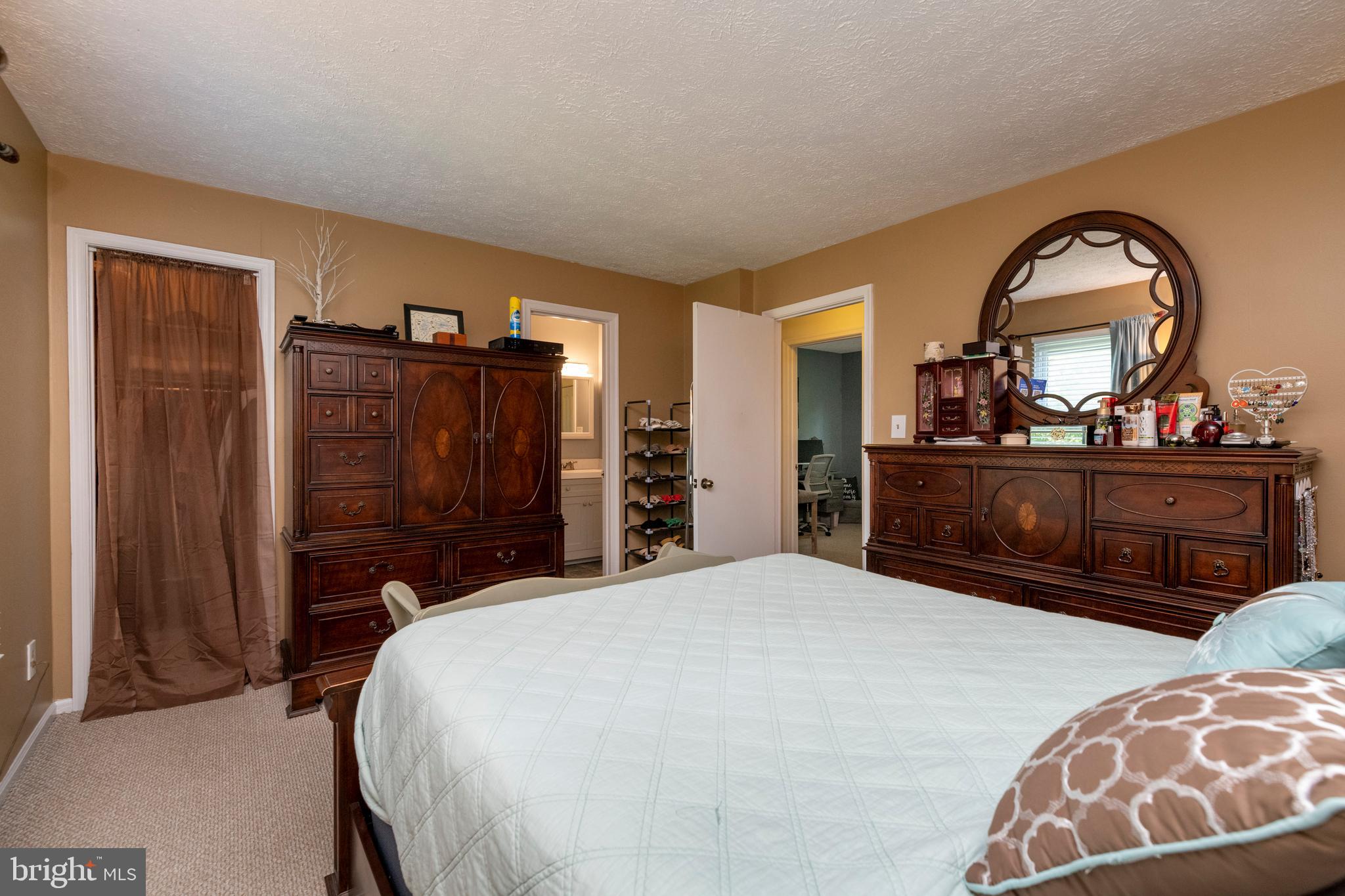 5014 Tartan Hill Road Perry Hall, MD 21128 - Photo 21 of 43 a bedroom with a bed and a dresser
