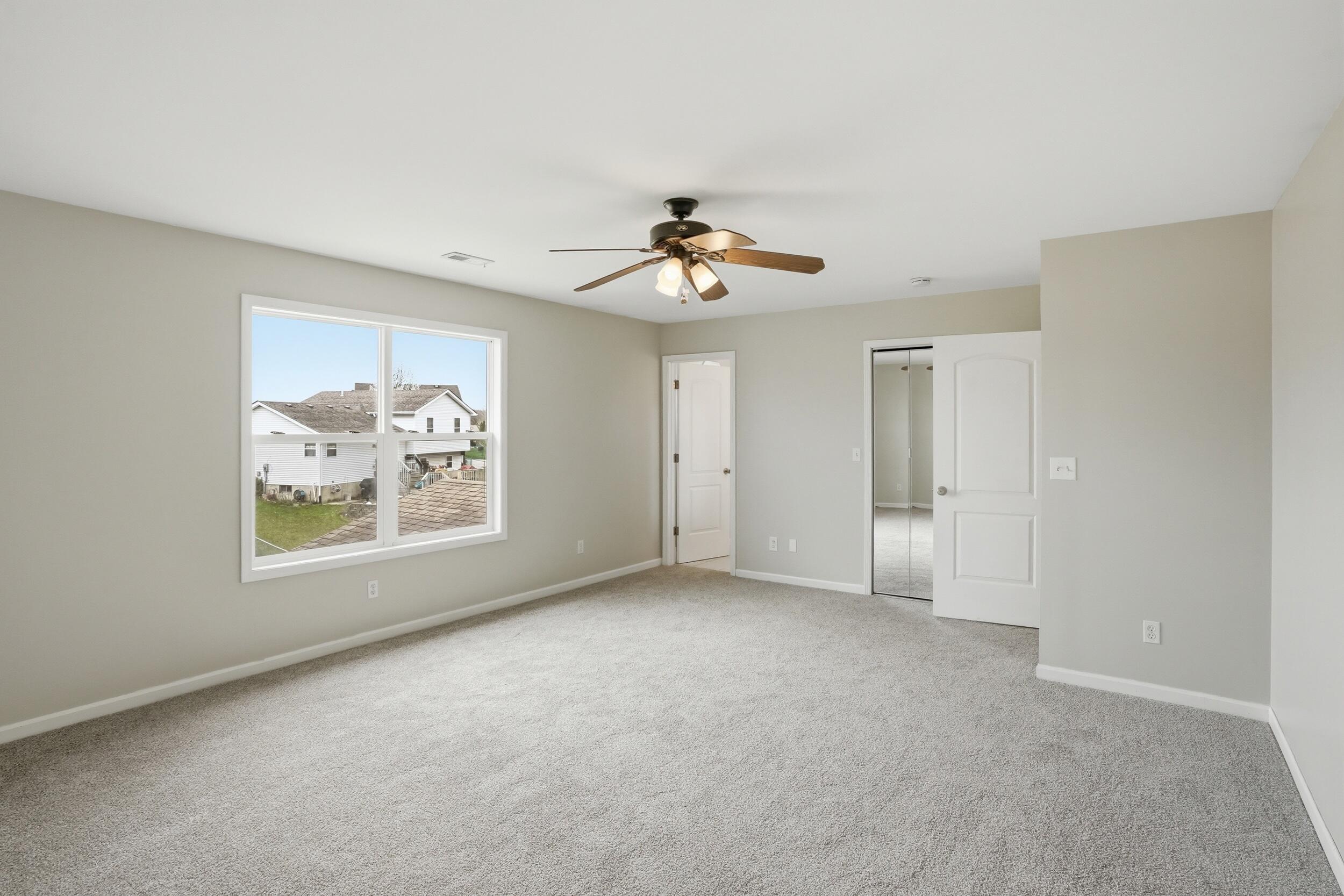 12358 Tippecanoe Place Crown Point, IN 46307 - Photo 16 of 30 a view of an empty room with a window