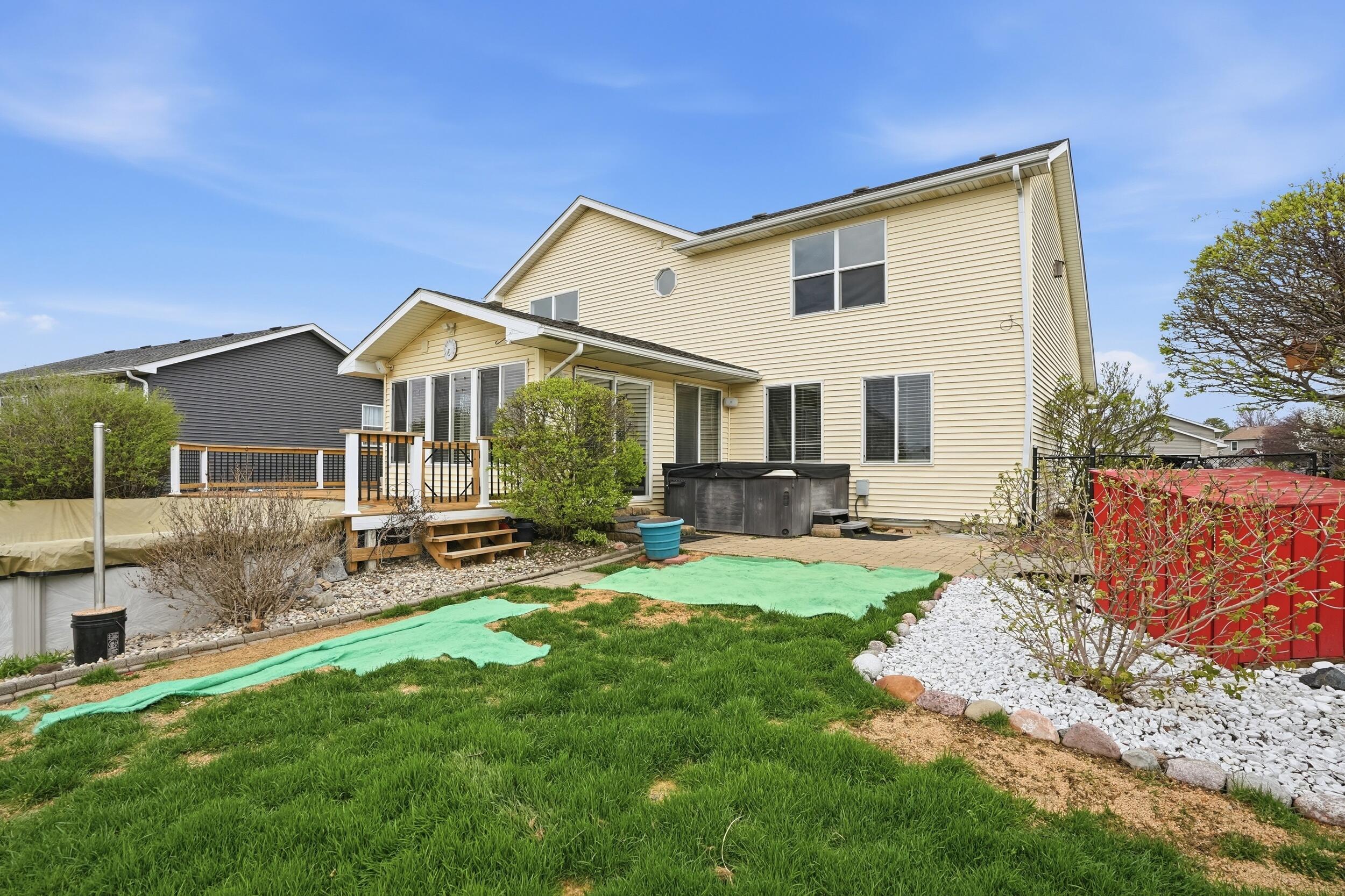 12358 Tippecanoe Place Crown Point, IN 46307 - Photo 28 of 30 a view of a house with a yard and sitting area