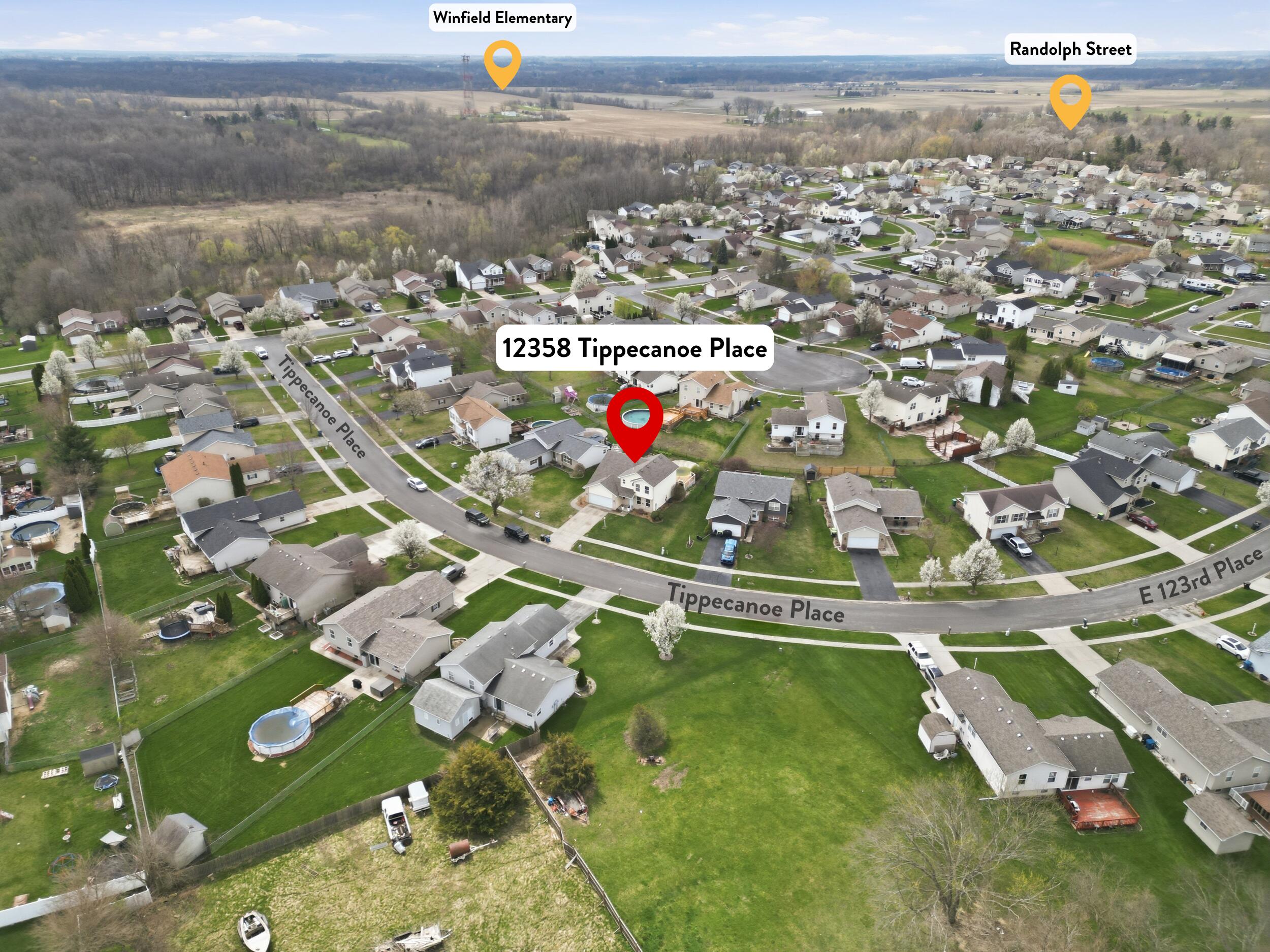 12358 Tippecanoe Place Crown Point, IN 46307 - Photo 3 of 30 an aerial view of residential houses with outdoor space