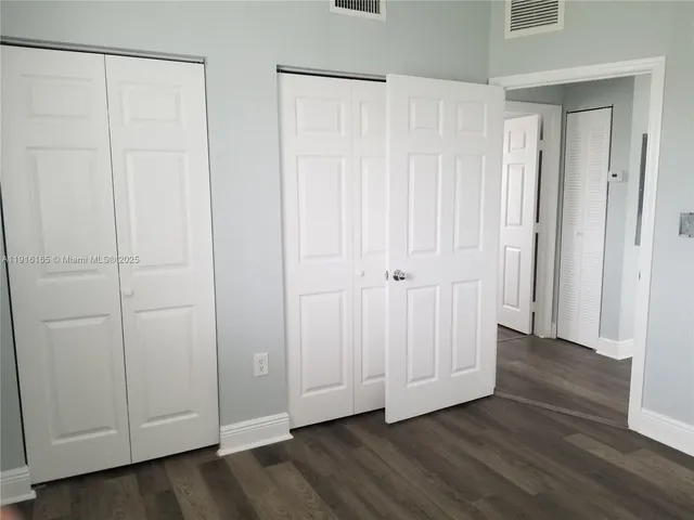 a view of a livingroom with hardwood floor