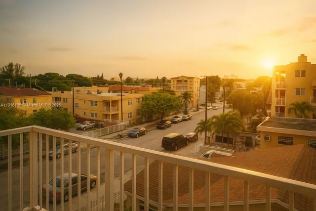 a view of a balcony with city view