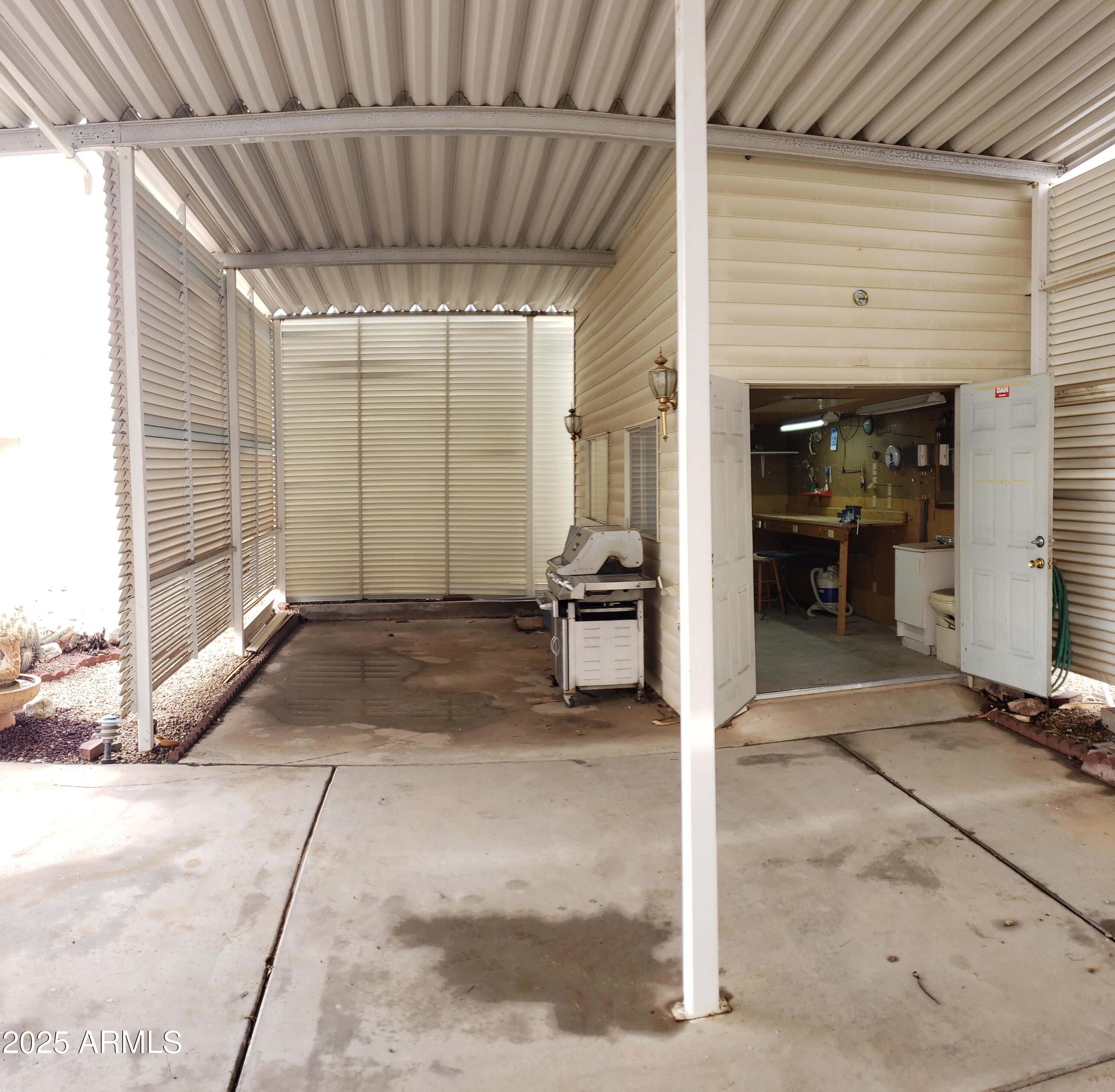 17200 West Bell Road, Unit 612 Surprise, AZ 85374 - Photo 3 of 19 a view of a hallway with wooden chairs