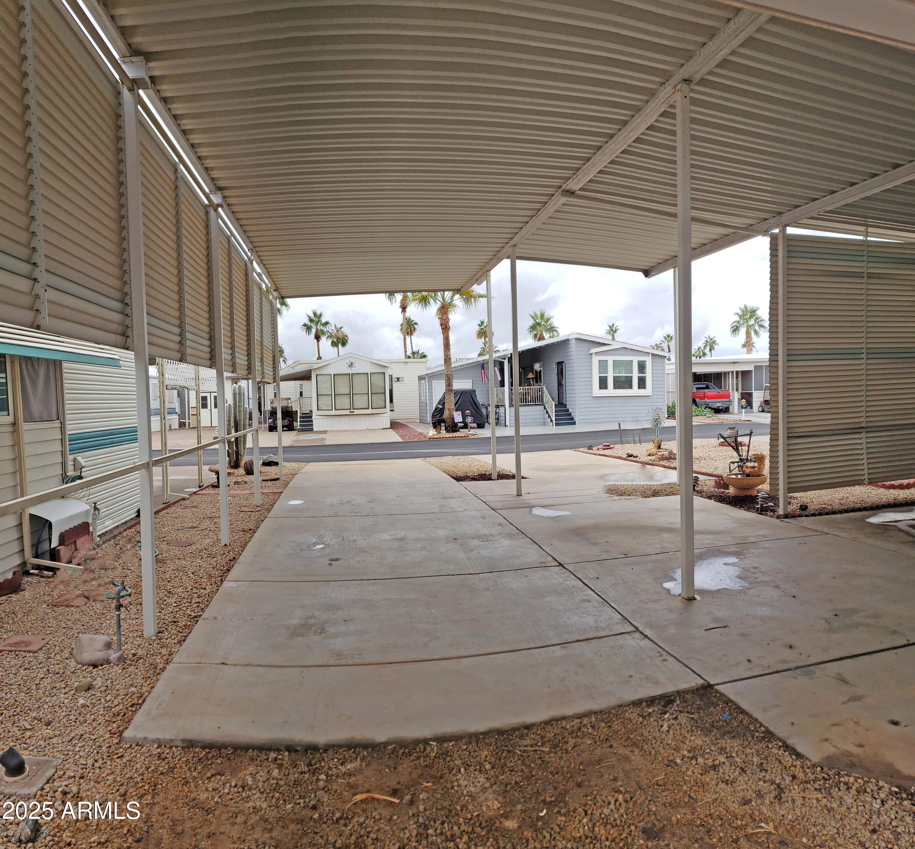 17200 West Bell Road, Unit 612 Surprise, AZ 85374 - Photo 4 of 19 a building with view of a street