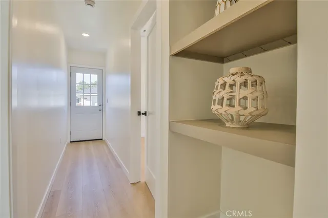 a view of entryway with wooden floor