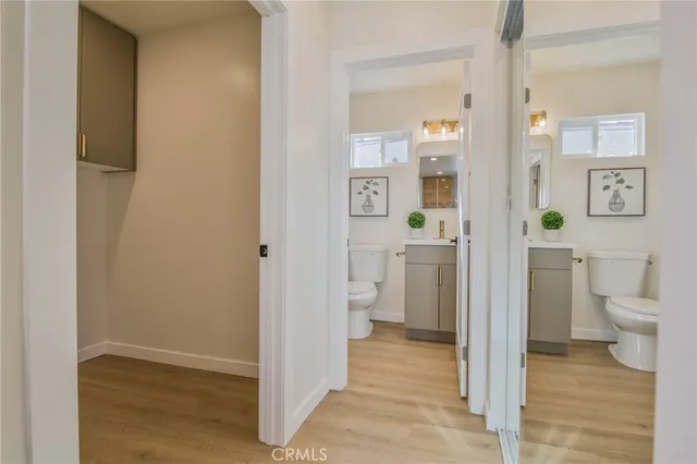 a view of a bathroom from a hallway