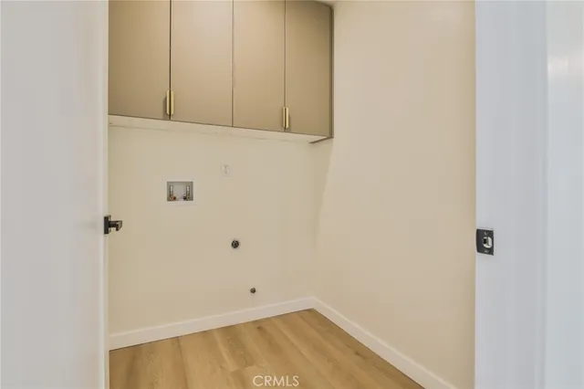 a view of small space with wooden floor