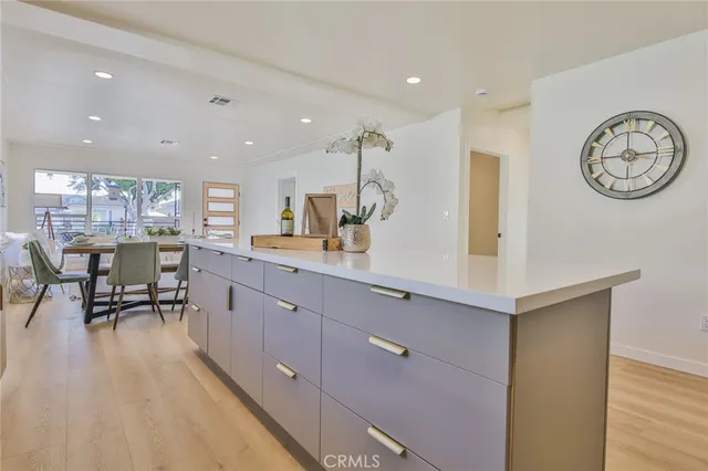 a very nice looking room with kitchen