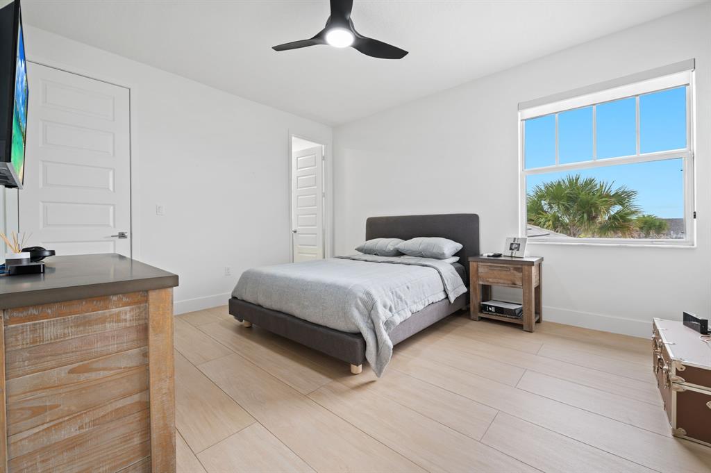 2001 Meadows Drive Davie, FL 33324 - Photo 23 of 40 a bedroom with a bed and a window