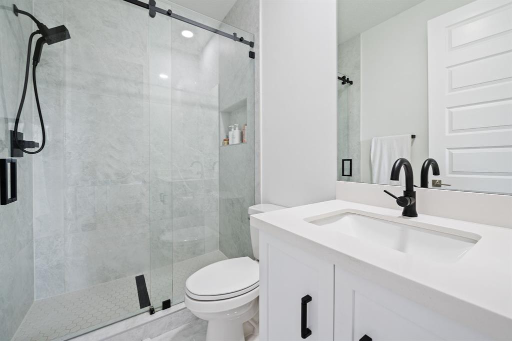 2001 Meadows Drive Davie, FL 33324 - Photo 31 of 40 a bathroom with a sink a toilet and shower