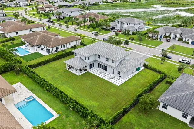 an aerial view of a house with a garden