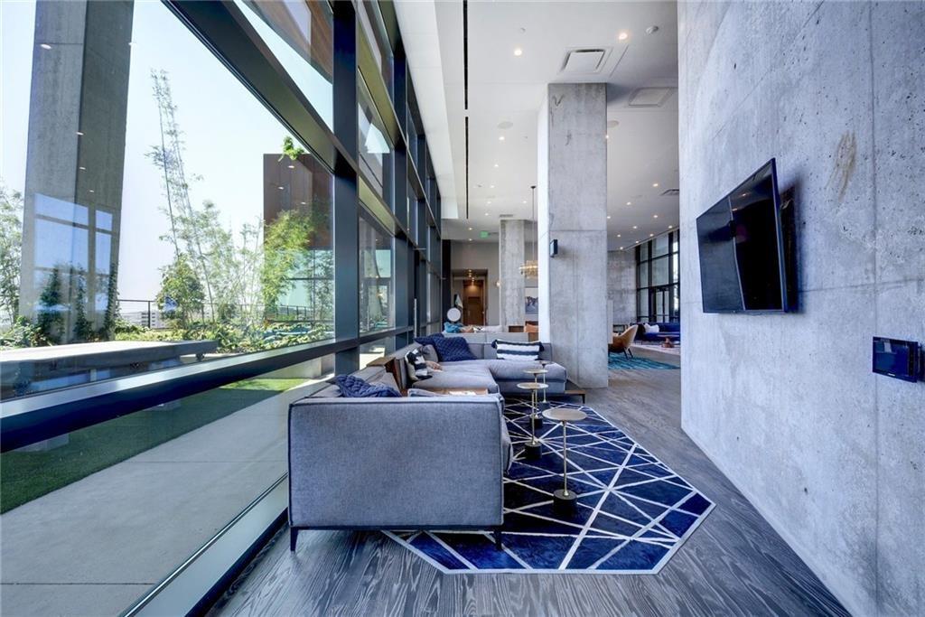 70 Rainey Street, Unit 1409 Austin, TX 78701 - Photo 27 of 38 Lobby featuring a high ceiling and recessed lighting