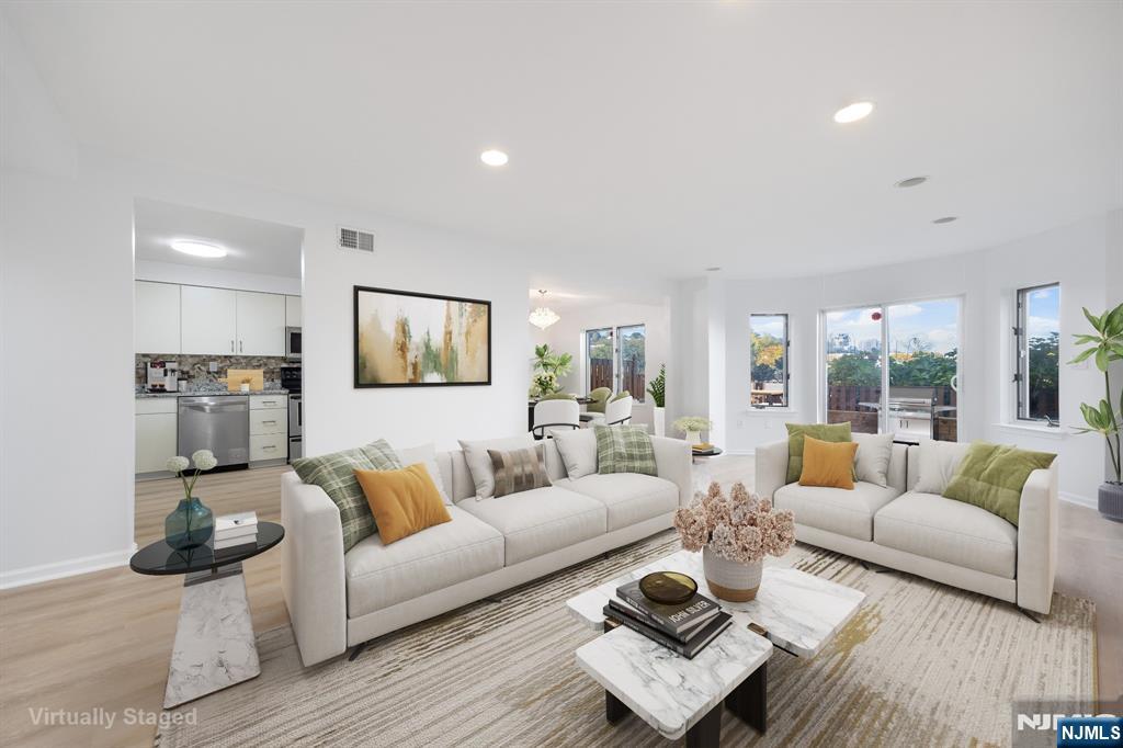 a living room with furniture and a couch