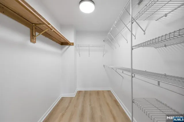 a view of a room with racks on the wall