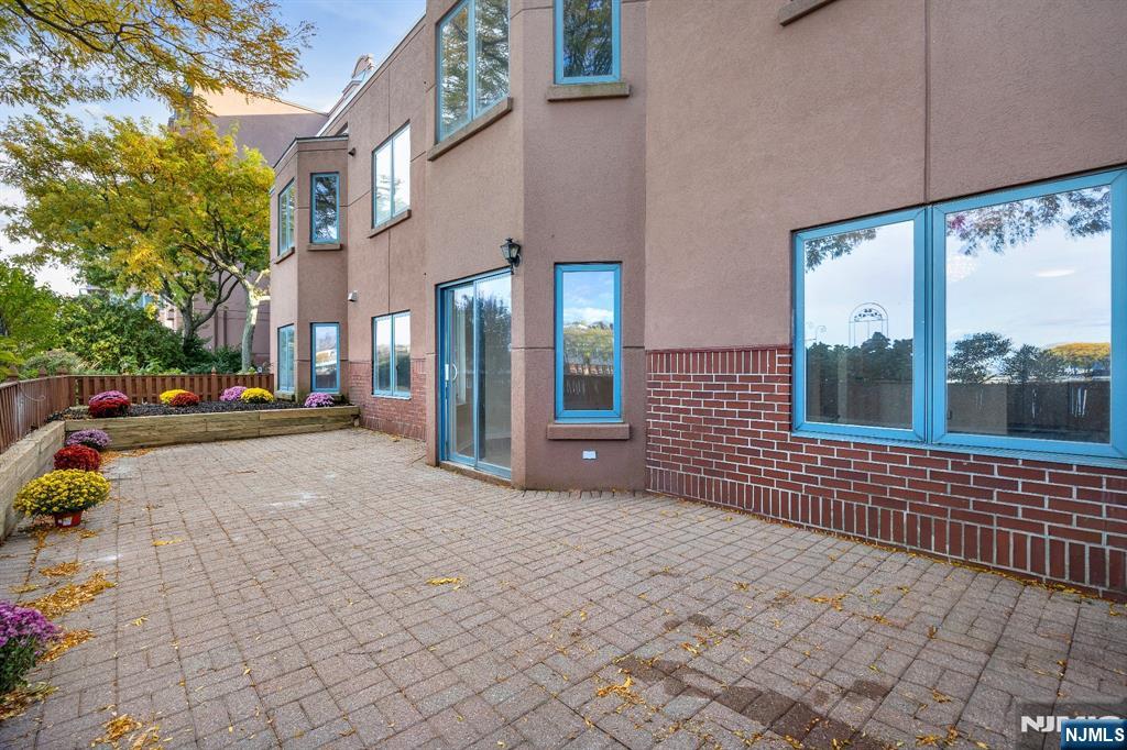 105 Nelson Court Edgewater, NJ 07020 - Photo 17 of 18 a view of a building with car parked