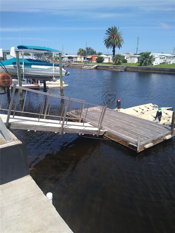 6621 Nautical Isle Hudson, FL 34667 - Photo 1 of 1 a view of outdoor space with lounge chair