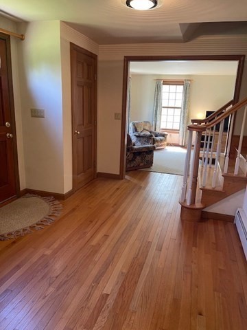 140 South Shaker Road Harvard, MA 01451 - Photo 11 of 38 a view of a livingroom with hardwood floor and a ceiling fan