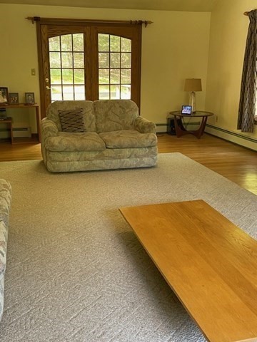 140 South Shaker Road Harvard, MA 01451 - Photo 12 of 38 a living room with a bed furniture and a window