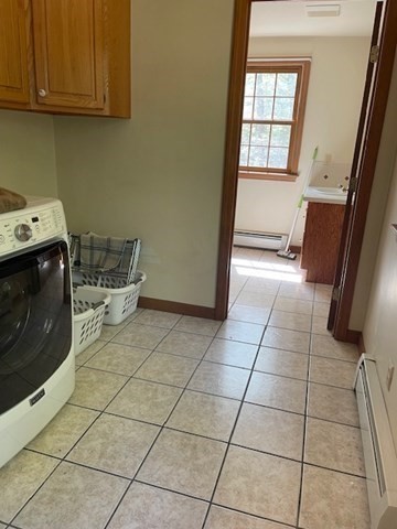 140 South Shaker Road Harvard, MA 01451 - Photo 14 of 38 a kitchen with a sink a stove and cabinets