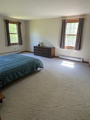 140 South Shaker Road Harvard, MA 01451 - Photo 18 of 38 a bedroom with a bed and a window