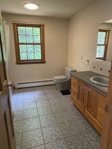 140 South Shaker Road Harvard, MA 01451 - Photo 21 of 38 a bathroom with a sink a toilet and window