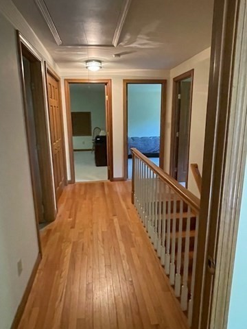 140 South Shaker Road Harvard, MA 01451 - Photo 24 of 38 a view of a hallway with wooden floor and staircase