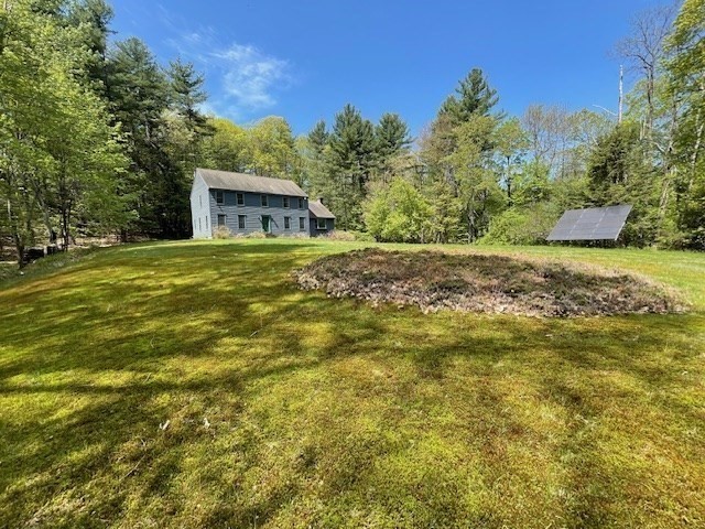 140 South Shaker Road Harvard, MA 01451 - Photo 30 of 38 a tall stone house with a yard