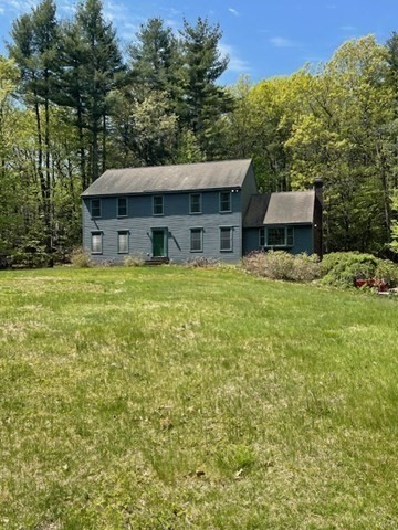 140 South Shaker Road Harvard, MA 01451 - Photo 34 of 38 a front view of a house with a yard