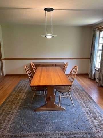 140 South Shaker Road Harvard, MA 01451 - Photo 7 of 38 a view of a dining room with furniture and wooden floor