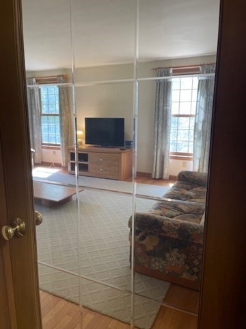 140 South Shaker Road Harvard, MA 01451 - Photo 9 of 38 a living room with fireplace furniture and a flat screen tv