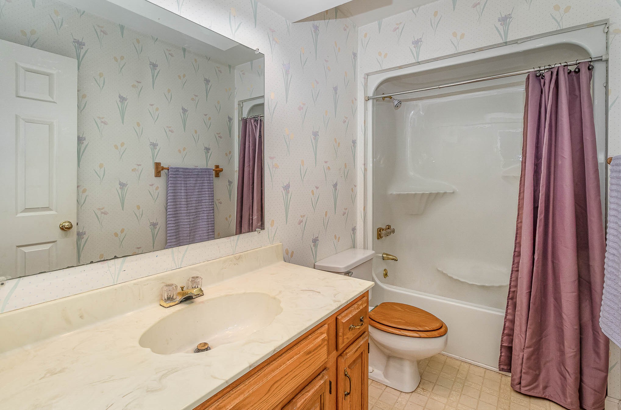 2437 Ravine Drive Nashville, TN 37217 - Photo 23 of 33 a bathroom with a sink a toilet and shower
