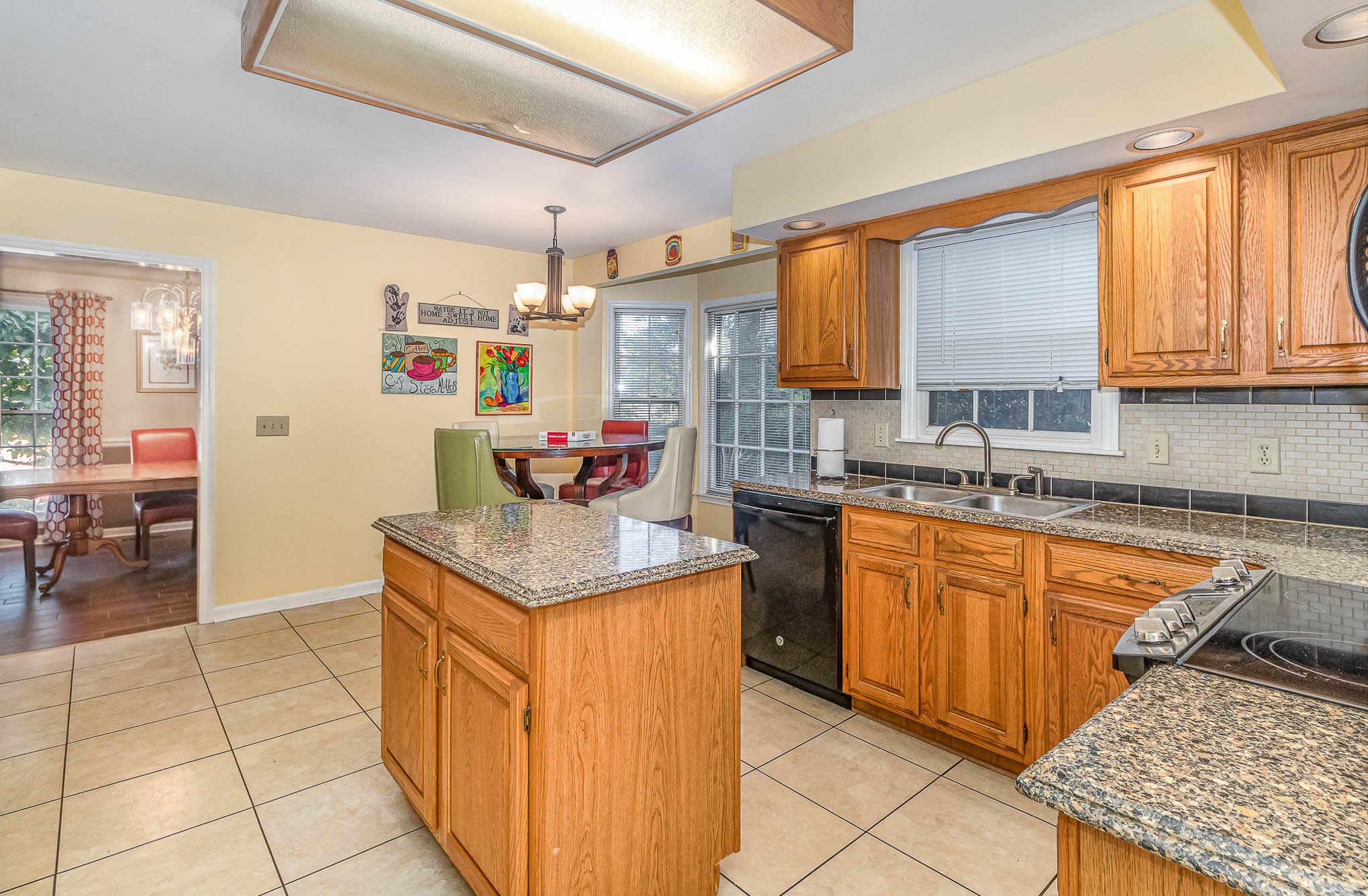 2437 Ravine Drive Nashville, TN 37217 - Photo 6 of 33 a kitchen with stainless steel appliances granite countertop a sink stove and cabinets