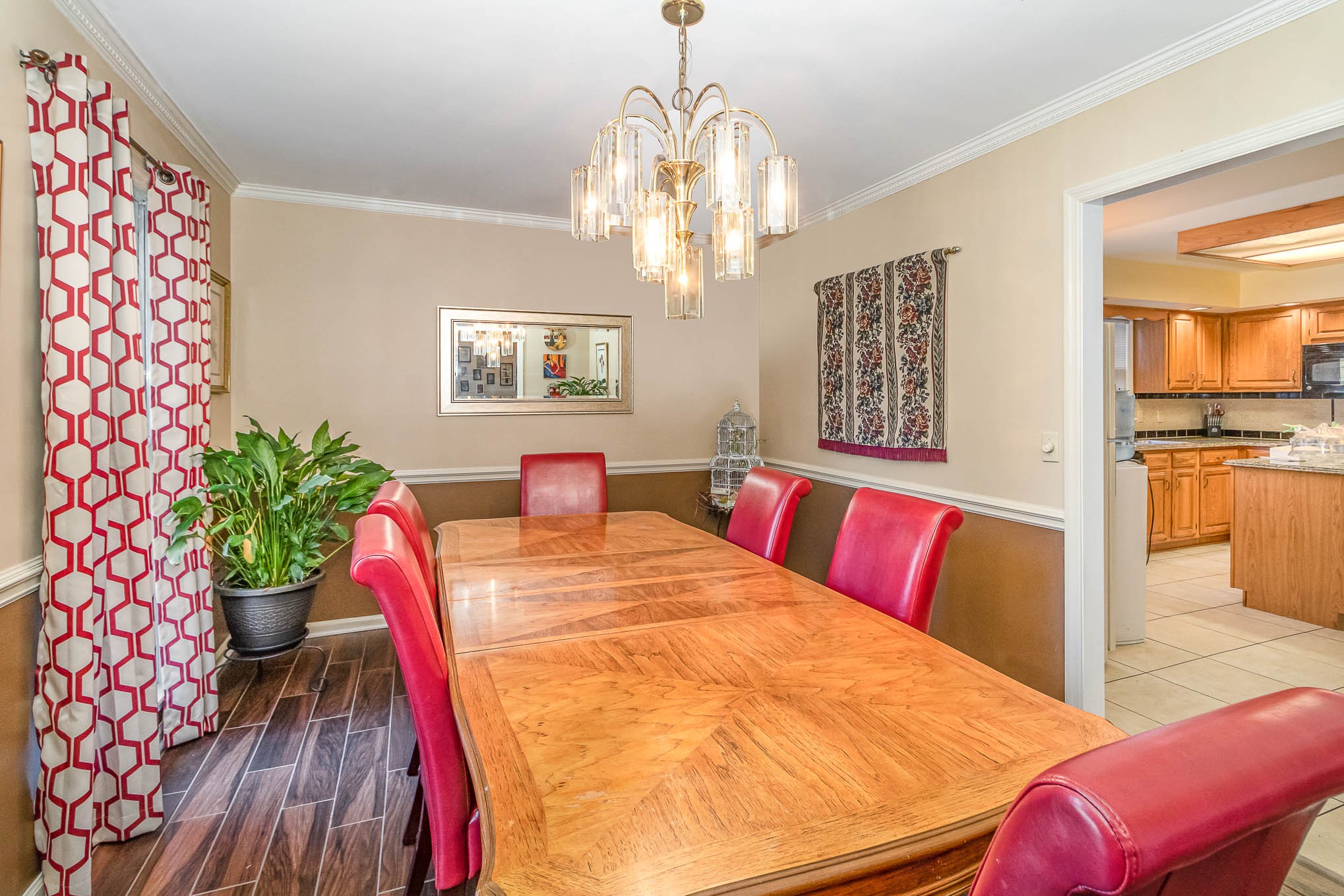 2437 Ravine Drive Nashville, TN 37217 - Photo 8 of 33 a bedroom with a bed and a chandelier