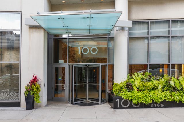 100 East 14th Street, Unit 708 Chicago, IL 60605 - Photo 2 of 25 a front view of a building with entryway