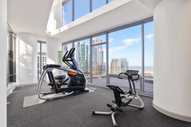 100 East 14th Street, Unit 708 Chicago, IL 60605 - Photo 17 of 25 a view of a room with gym equipment