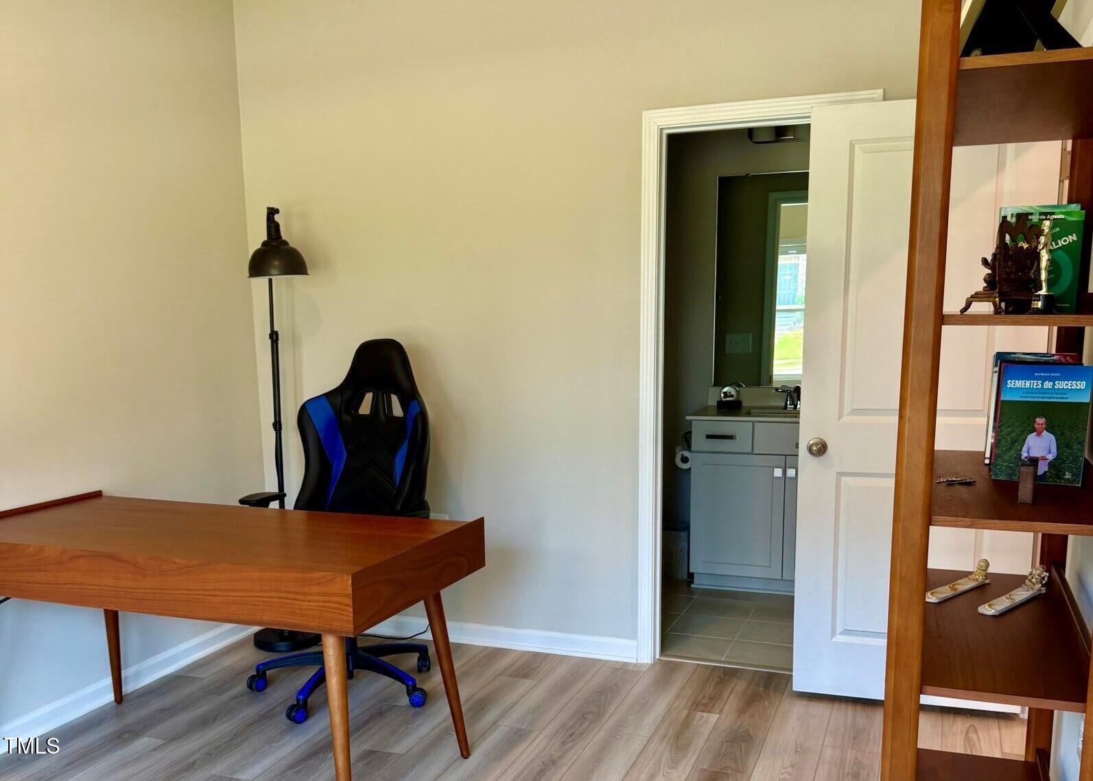 730 Firebrick Drive Cary, NC 27519 - Photo 8 of 38 a view of a workspace with furniture and wooden floor