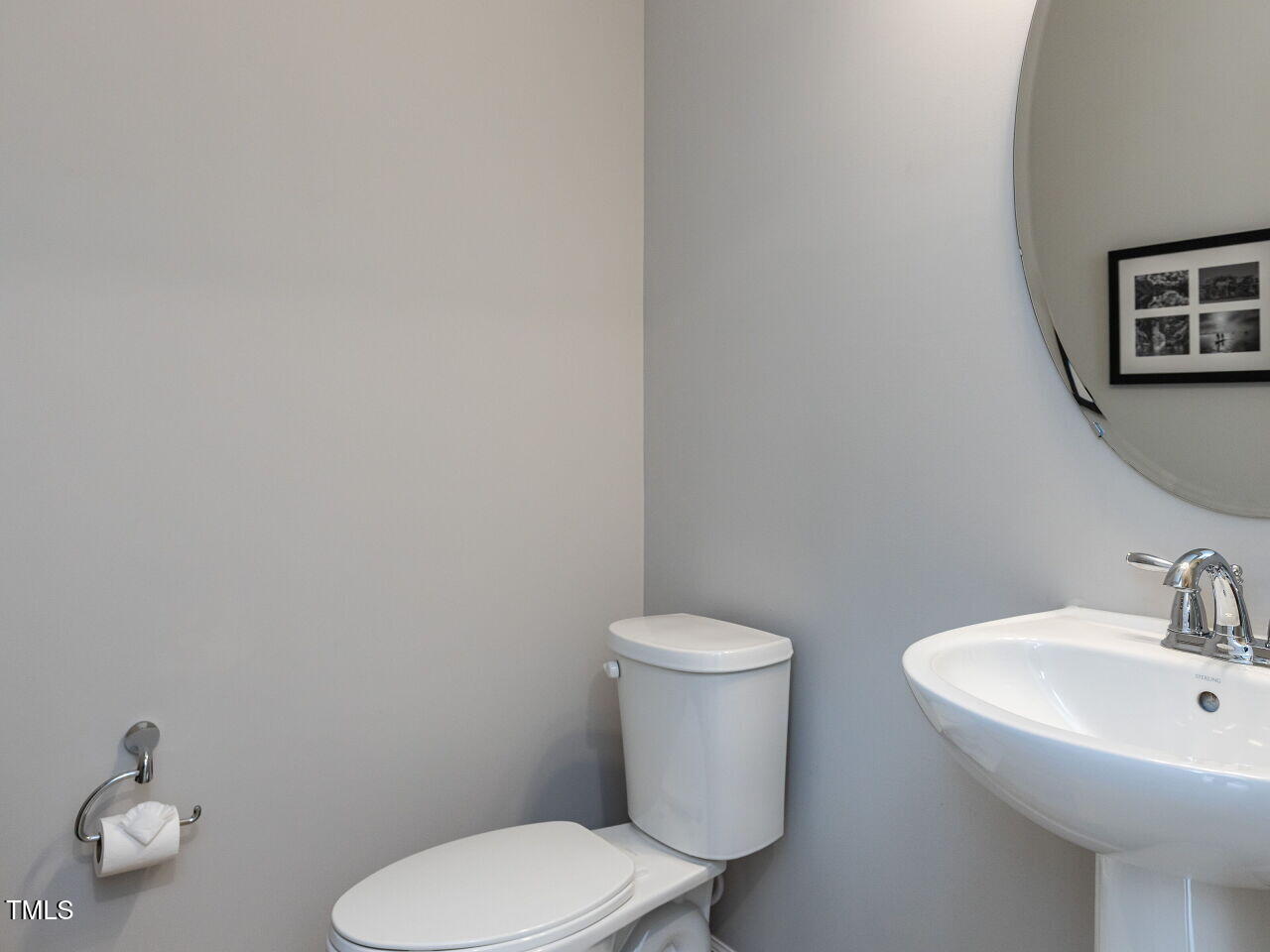 730 Firebrick Drive Cary, NC 27519 - Photo 17 of 38 a white toilet sitting next to a white sink