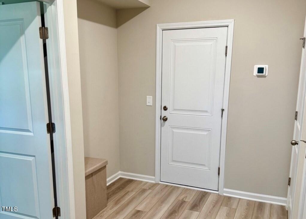 730 Firebrick Drive Cary, NC 27519 - Photo 5 of 38 a view of a bathroom with wooden floor