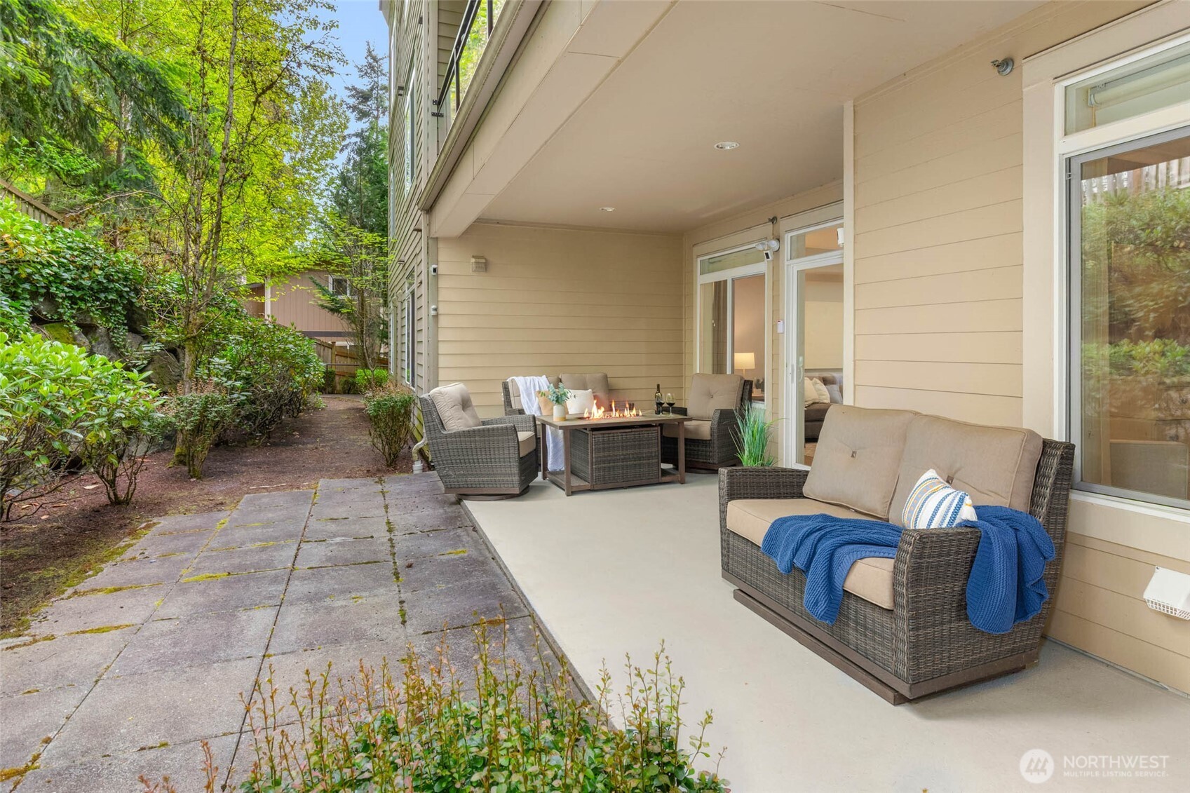 8850 Redmond-Woodinville Road Northeast, Unit 305 Redmond, WA 98052 - Photo 19 of 23 a view of a patio with couches and potted plants