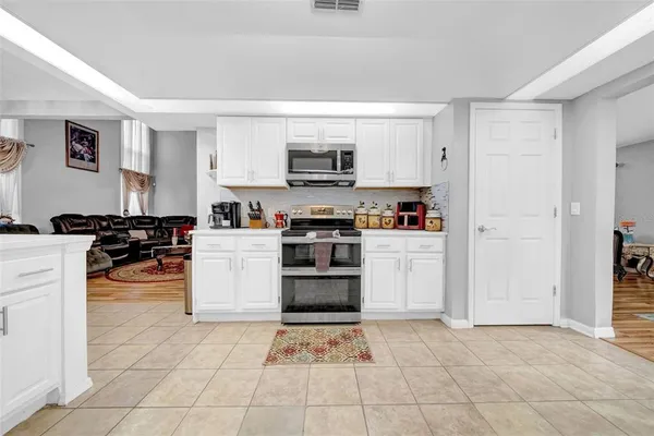 a living room with furniture and a couch